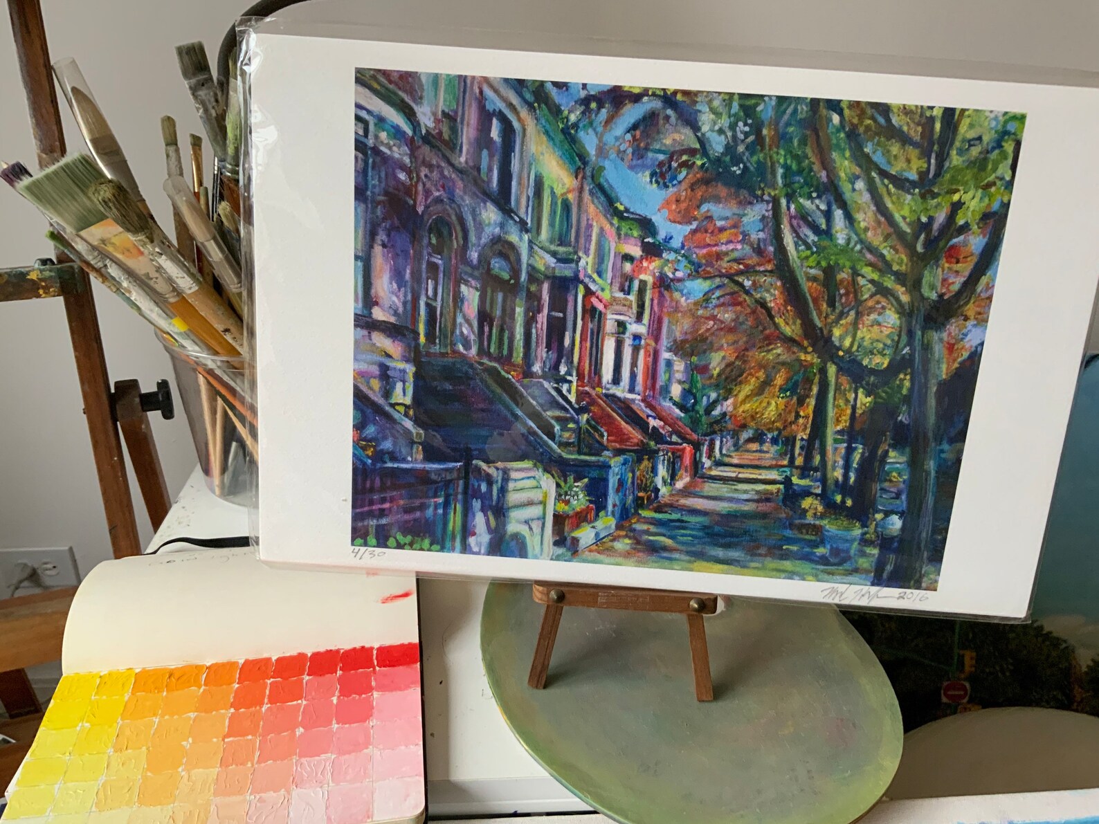 "11"x17" Midwood Street Brownstones giclee print on artist's table with color research study notebook