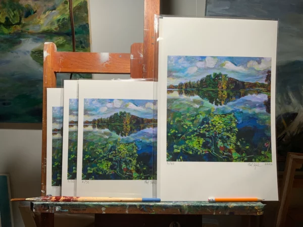 Size comparison of 8.5x11 and 11x17 'Picturesque Prospect Park Lake' giclee prints on painting easel