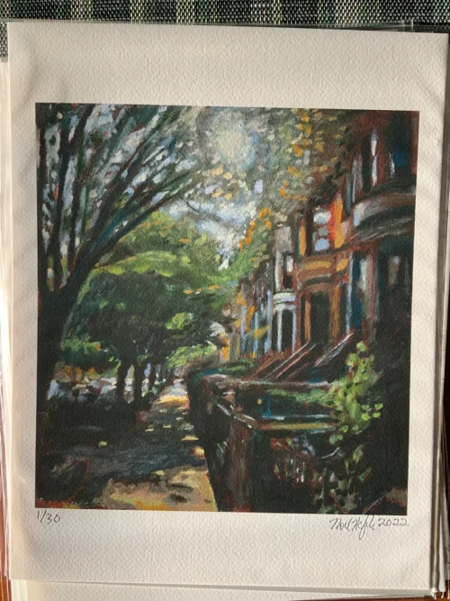 Stack of signed and sealed giclee prints of sunlit brownstone street painting
