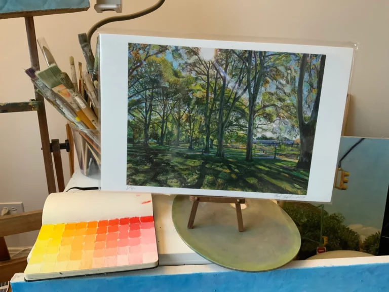 11"x17" size giclee print of London plane trees on artist table with brushes in the background