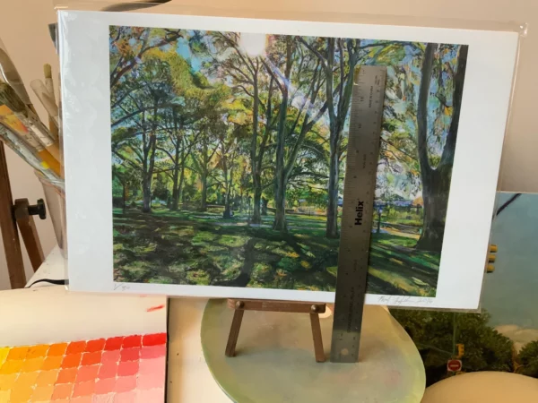 11"x17" size giclee print of London plane trees on artist table with ruler to show height