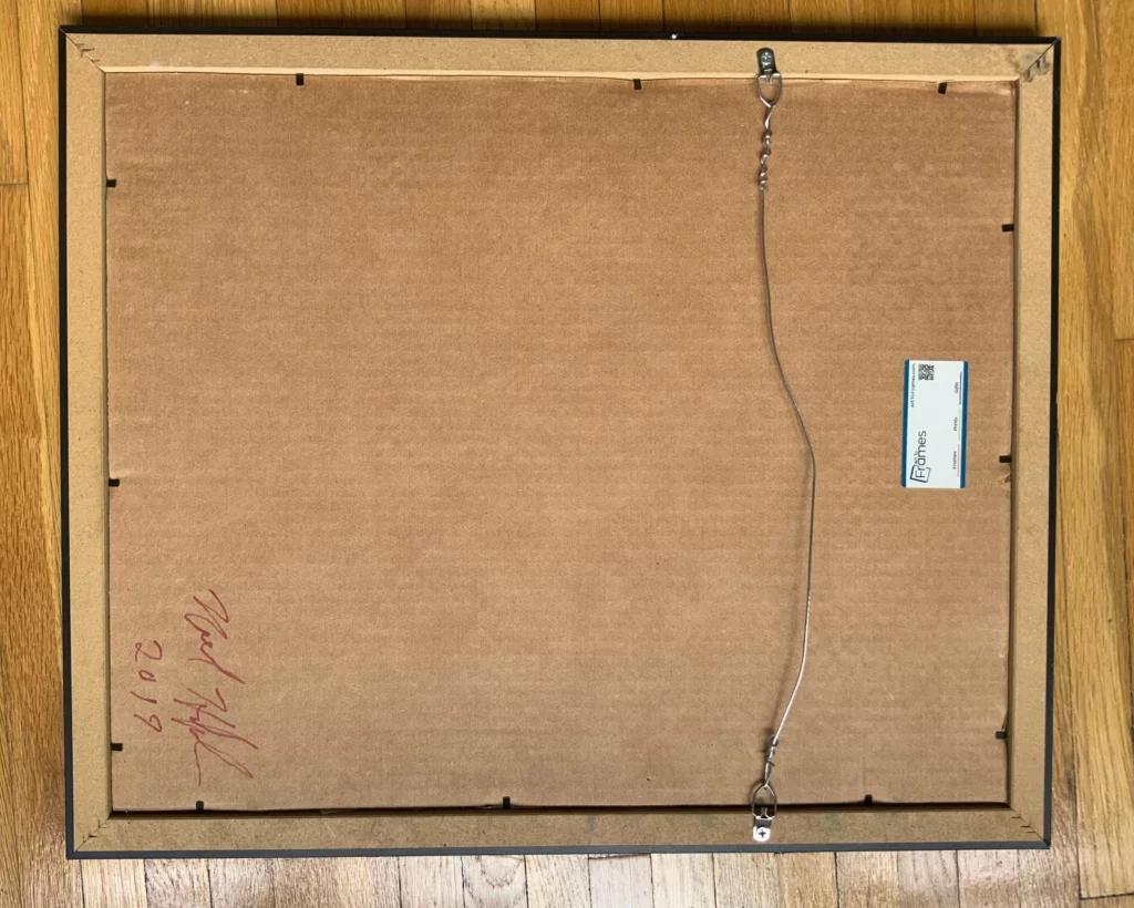 Back view of blue and green abstract painting