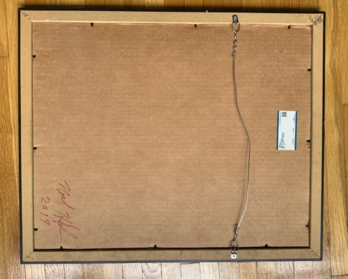 Back view of blue and green abstract painting