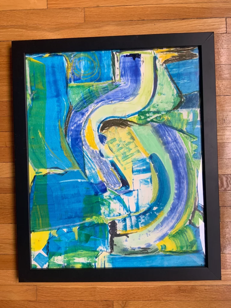 Blue and green abstract painting in black frame