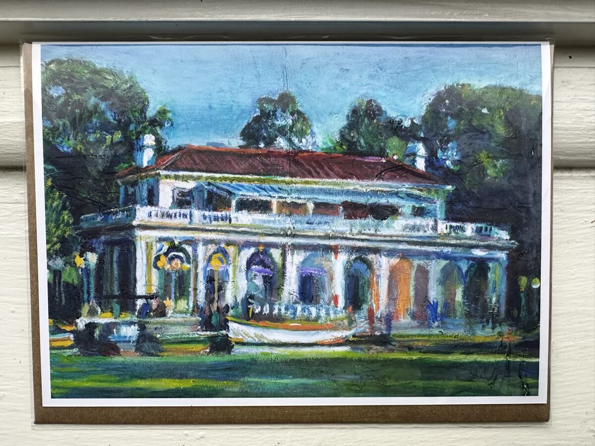 Greeting card featuring an oil painting by Noel Hefele of the iconic Prospect Park Boathouse in Brooklyn, NY amidst lush greenery.
